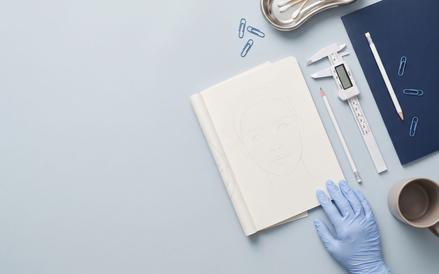 Blank face planning pad, caliper, and folder for beard transplant graft planning