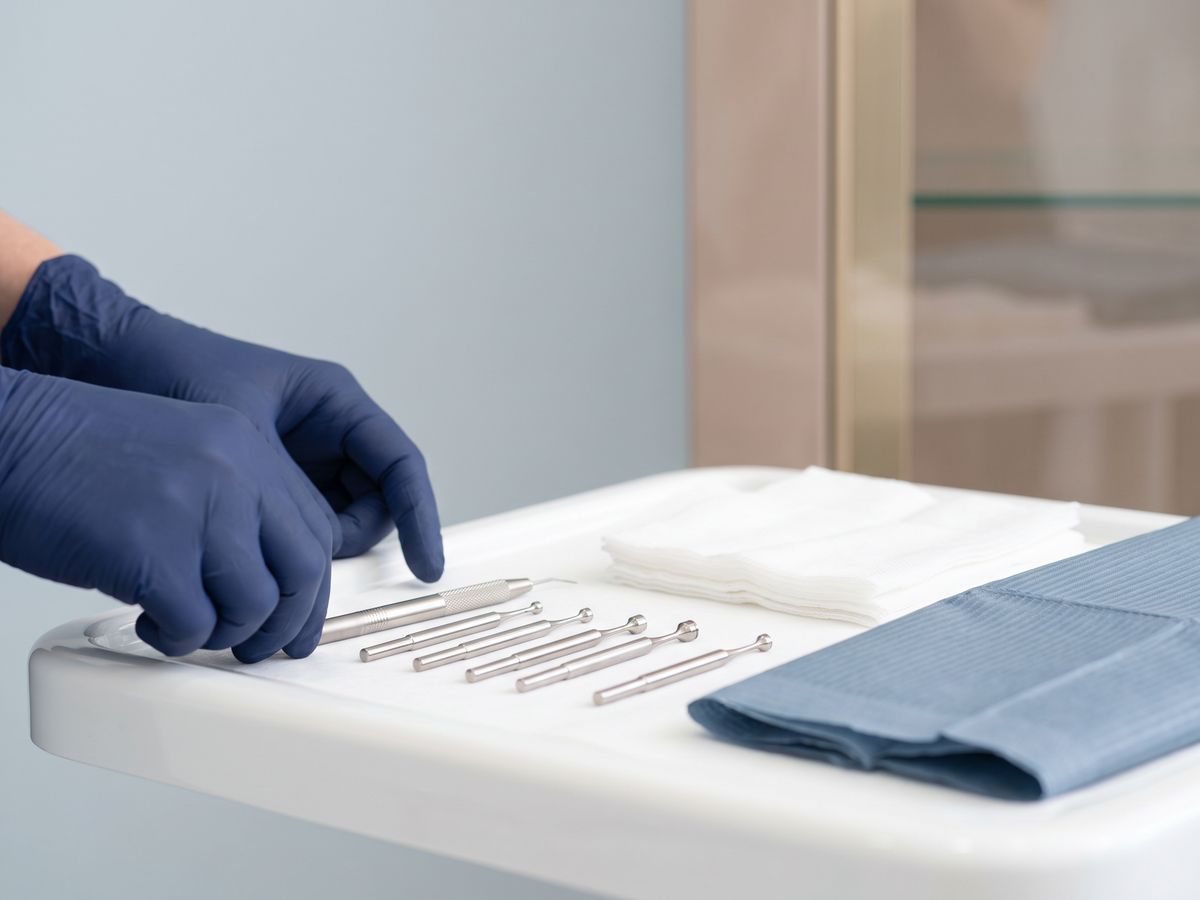 Surgeon placing eyebrow grafts at a flat angle